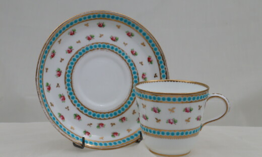 Minton hand painted and gilded cup and saucer